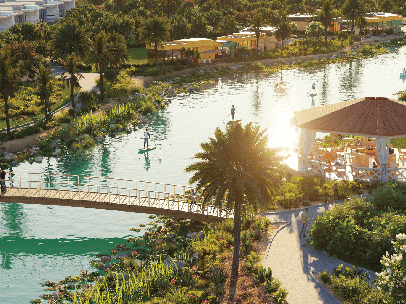 The image shows the Malibu Bay artificial beach, the lazy river, the wave surfing pool, and the floating pool.