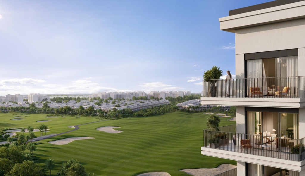 A captivating view of a golf course from a balcony in a modern apartment building.