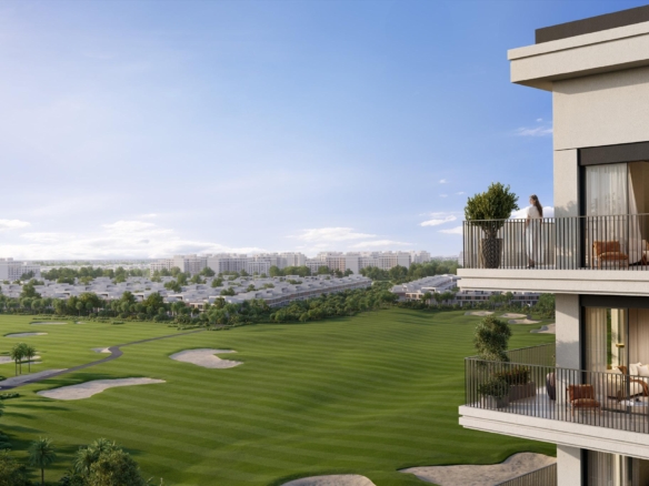 A captivating view of a golf course from a balcony in a modern apartment building.