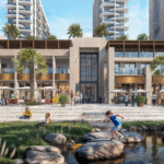 Sobha Aquamont waterfront apartments in Downtown UAQ with sea views, modern architecture, and lush green spaces