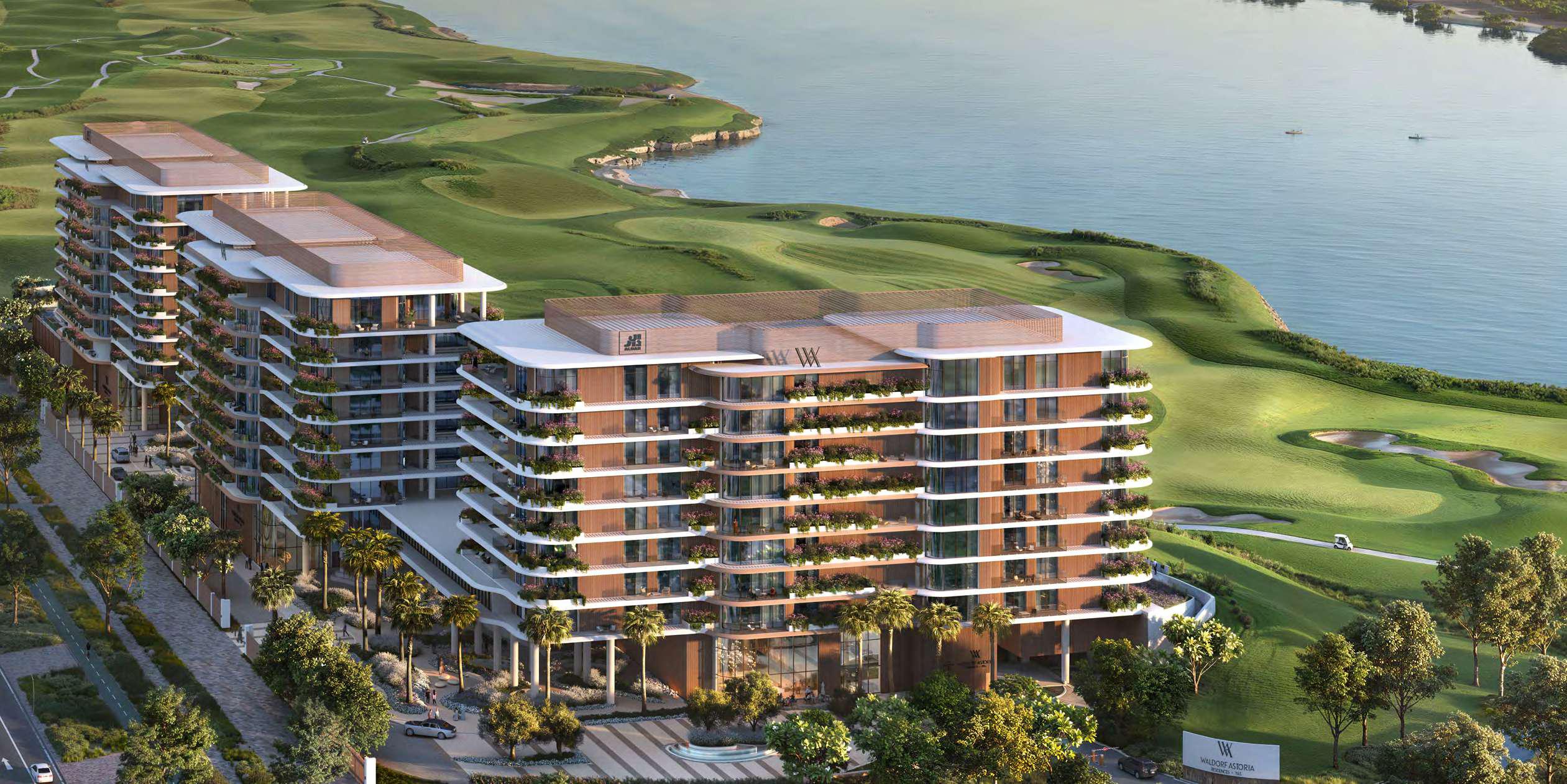 Waldorf Astoria Residences Yas Island by Aldar overlooking Yas Links Golf Course and Yas Marina Circuit in Abu Dhabi.