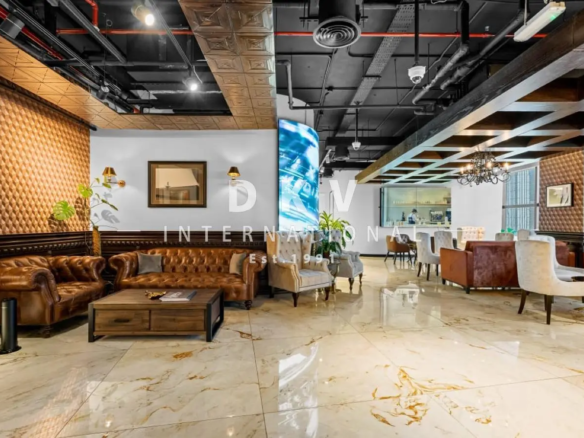 Office for rent in The Opus – furnished 308 sqft workspace with city view in Business Bay Dubai.