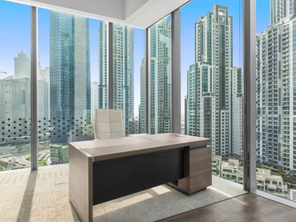 Office for rent in The Opus – furnished 945 sqft workspace with Burj Khalifa view in Business Bay Dubai.