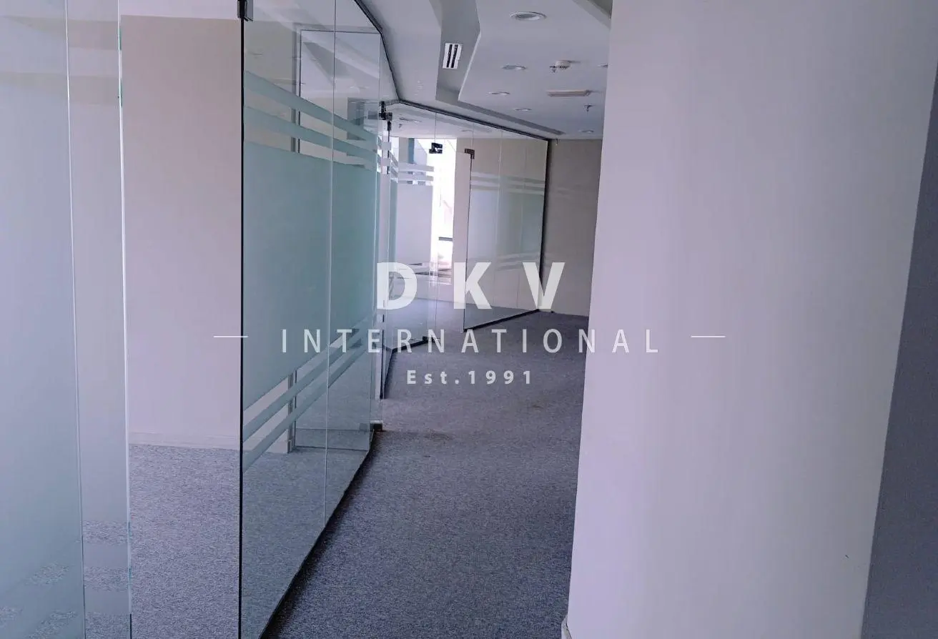 Regal Tower Business Bay – 1,495 sqft fitted office with canal view and 5 partitions