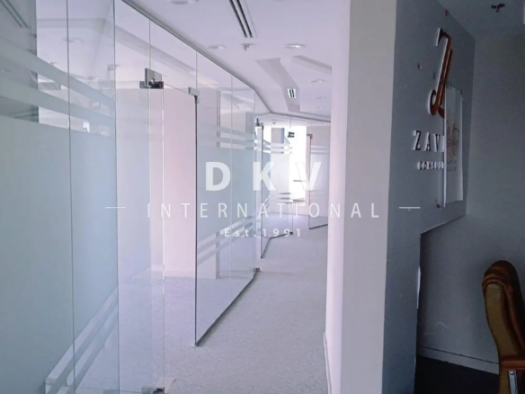 Regal Tower Business Bay – 1,495 sqft fitted office with canal view and 5 partitions