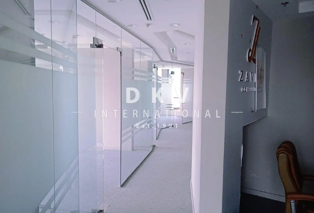 Regal Tower Business Bay – 1,495 sqft fitted office with canal view and 5 partitions