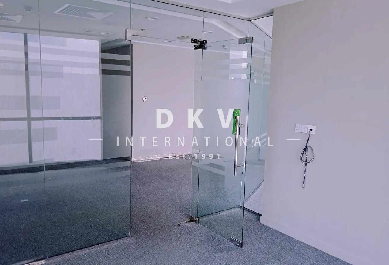 Regal Tower Business Bay – 1,495 sqft fitted office with canal view and 5 partitions