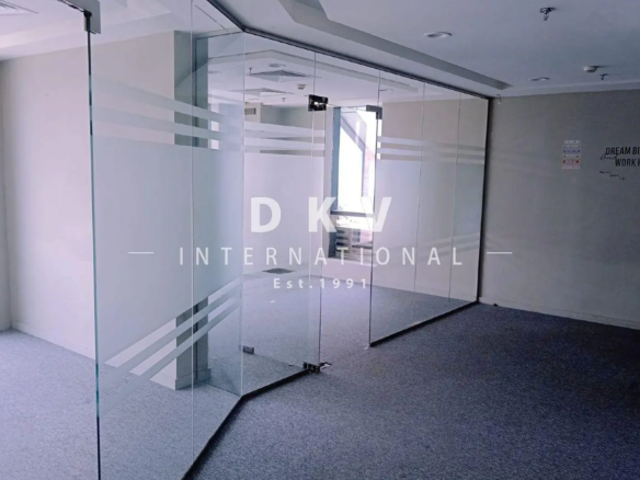 Regal Tower Business Bay – 1,495 sqft fitted office with canal view and 5 partitions