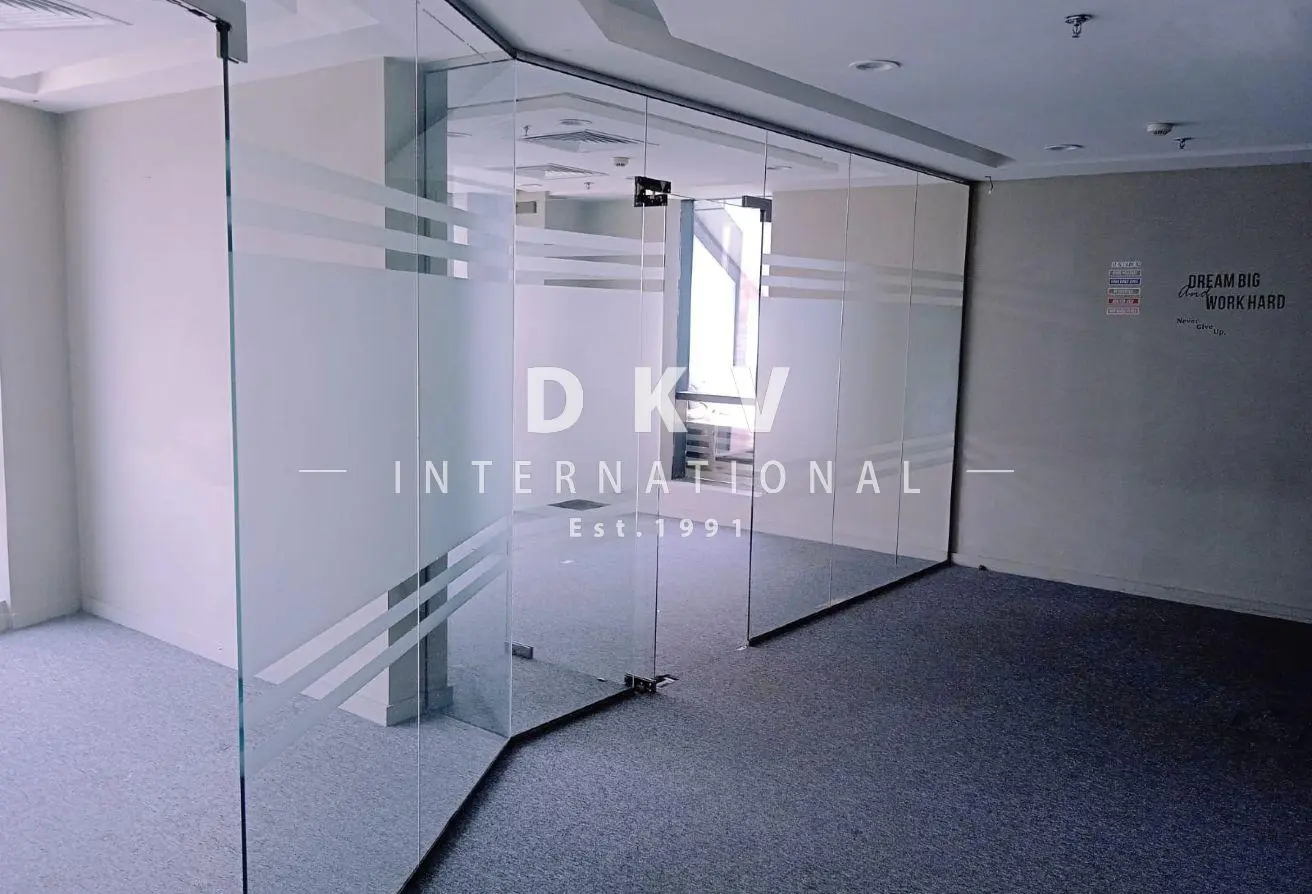 Regal Tower Business Bay – 1,495 sqft fitted office with canal view and 5 partitions